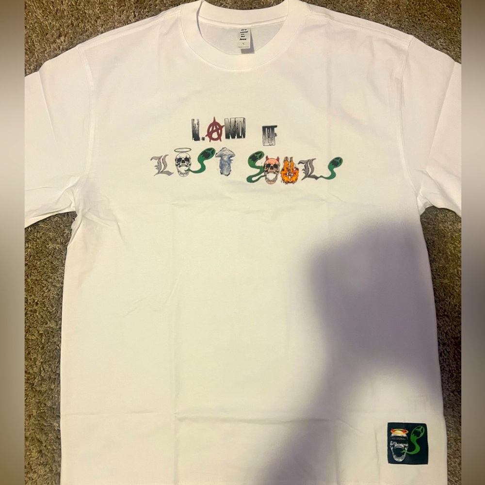 100% white cotton t-shirt with screen printed design on front and back